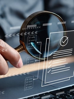magnifying glass data review iStock-1465316262 250