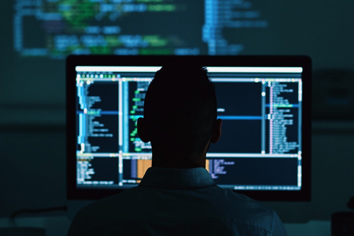 man at computer cyber iStock-910422618 crop