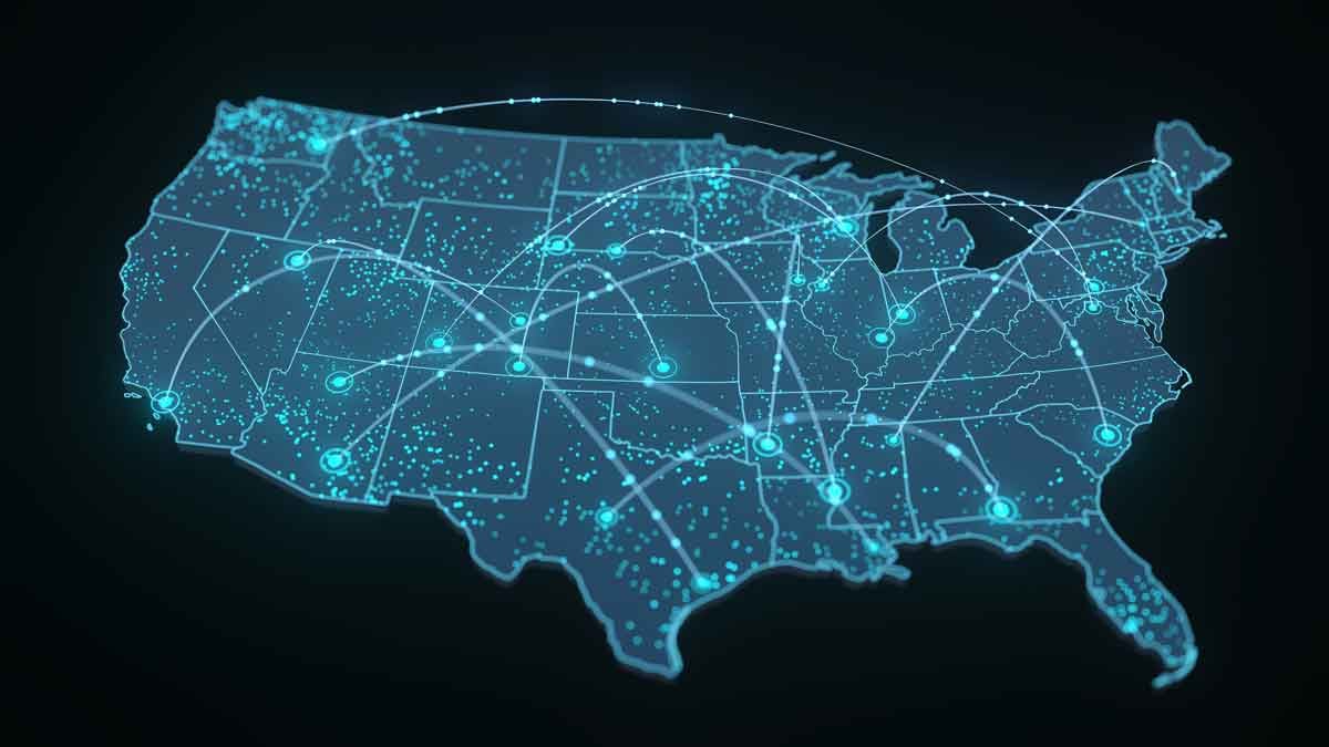 Digital map of USA with glowing teal outline and interconnected network of bright nodes representing cities, linked by illuminated pathways on dark background.